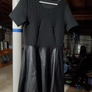 Dress with Black patten leather skirt.